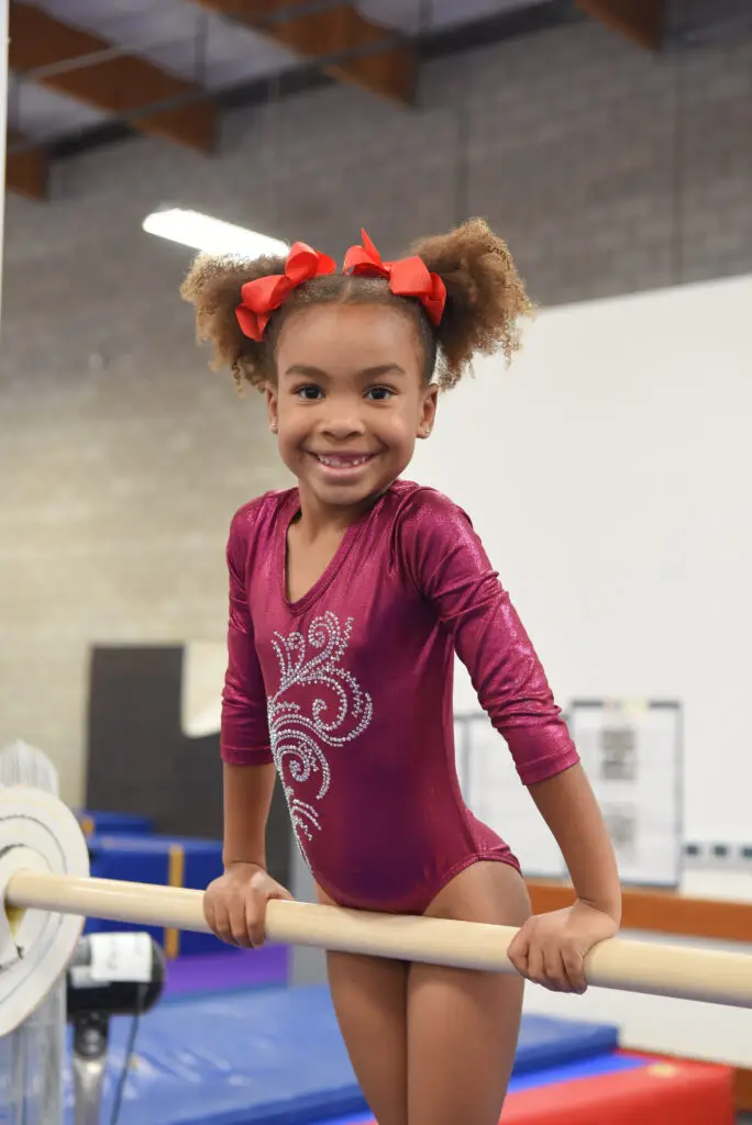 Girls Gymnastics Bars Practice